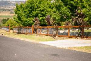 Saltram Rural Cypress Fence finished with natural timber oil