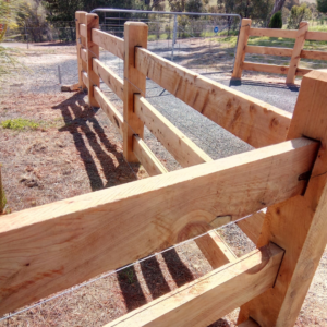 photo of fully morticed timber post and rail fence, unfinished