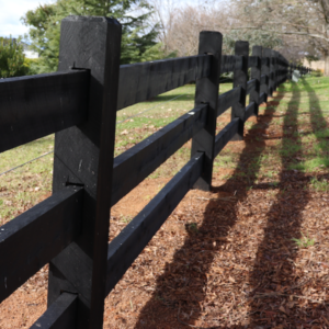 photo of post and rail fence finished in Kentucky Horse Black paint