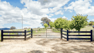 Photo of Saltram Rural 4 panel DIY timber post and rail fence and steel gate.