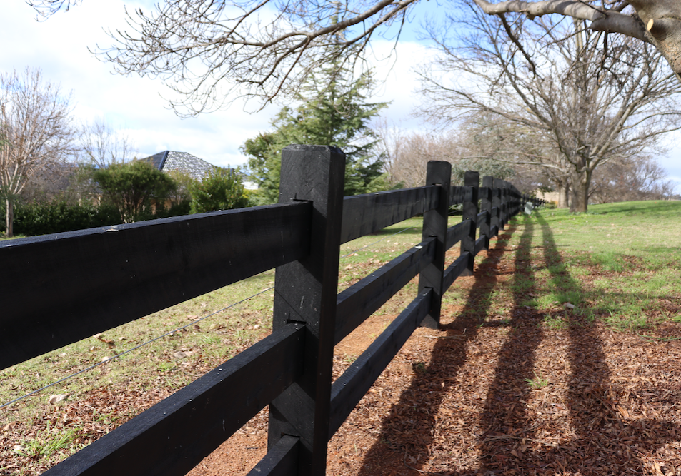photo of timber post and rail fence, finished in Kentucky Horse Black, by Saltram Rural