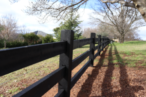 photo of timber post and rail fence, finished in Kentucky Horse Black, by Saltram Rural